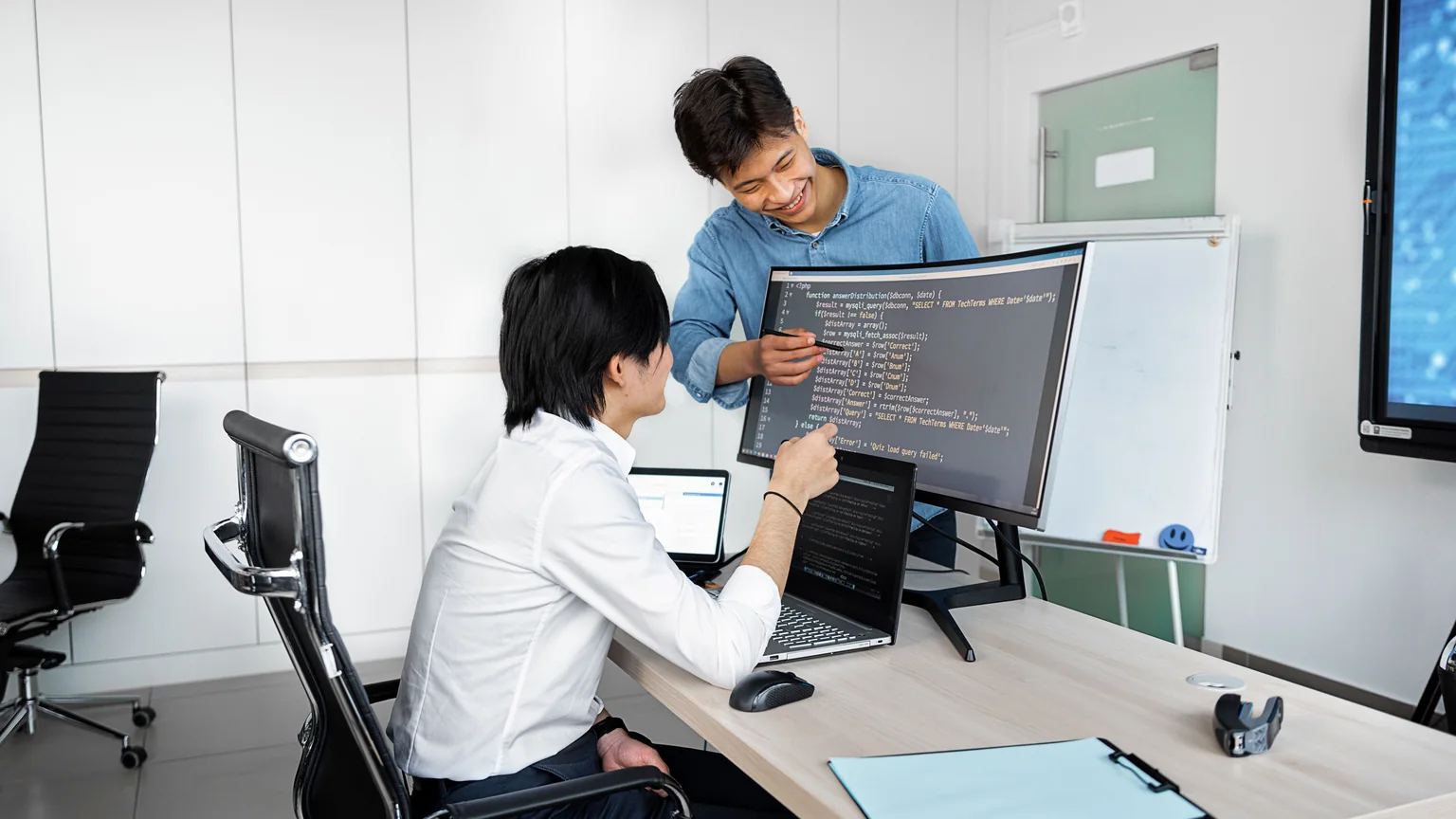 IT implementation team reviewing a cloud deployment